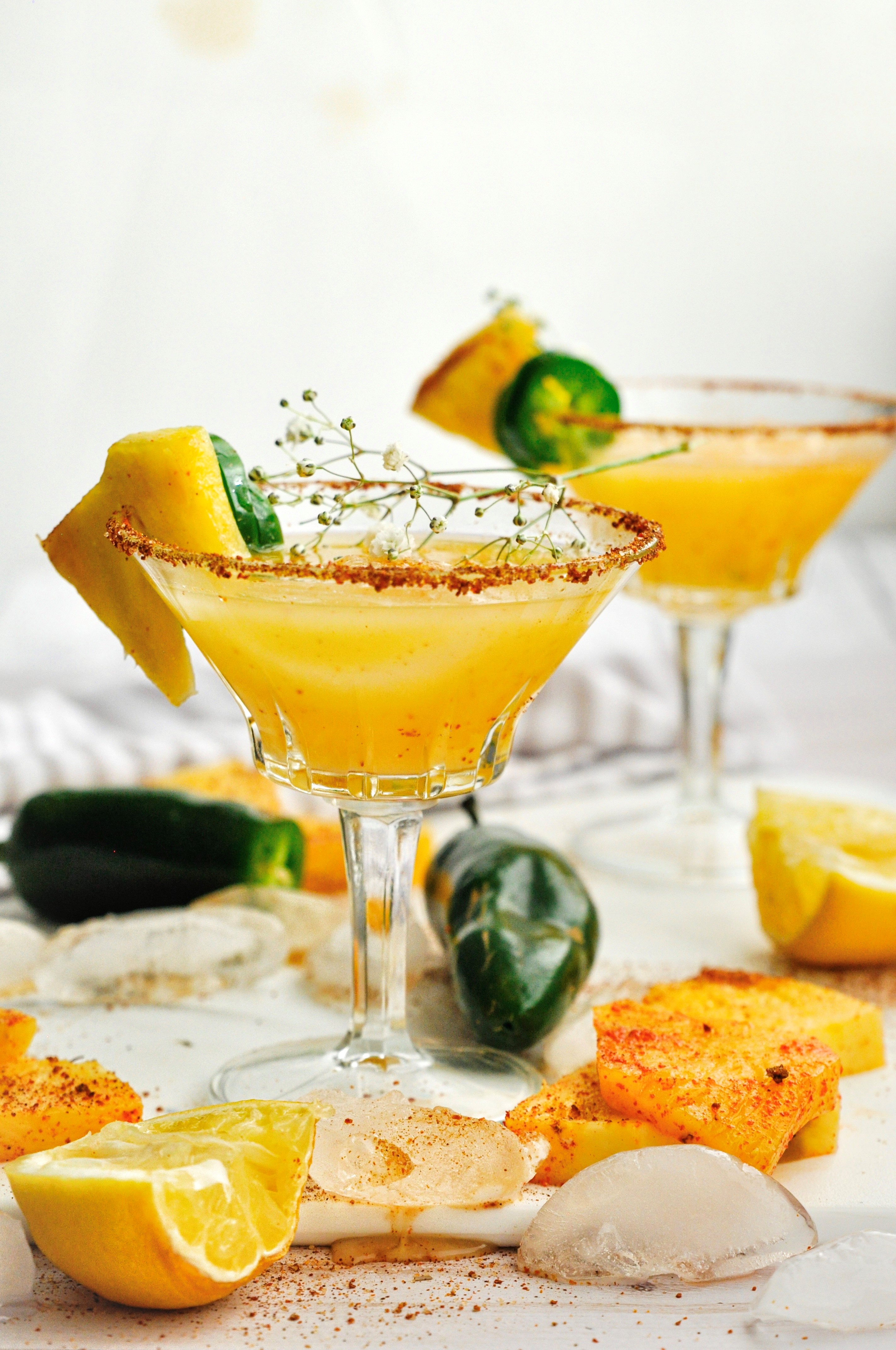 This sweet, spicy and sour grilled pineapple and jalapeno mocktail will add an island vibe to your summer pool side parties!