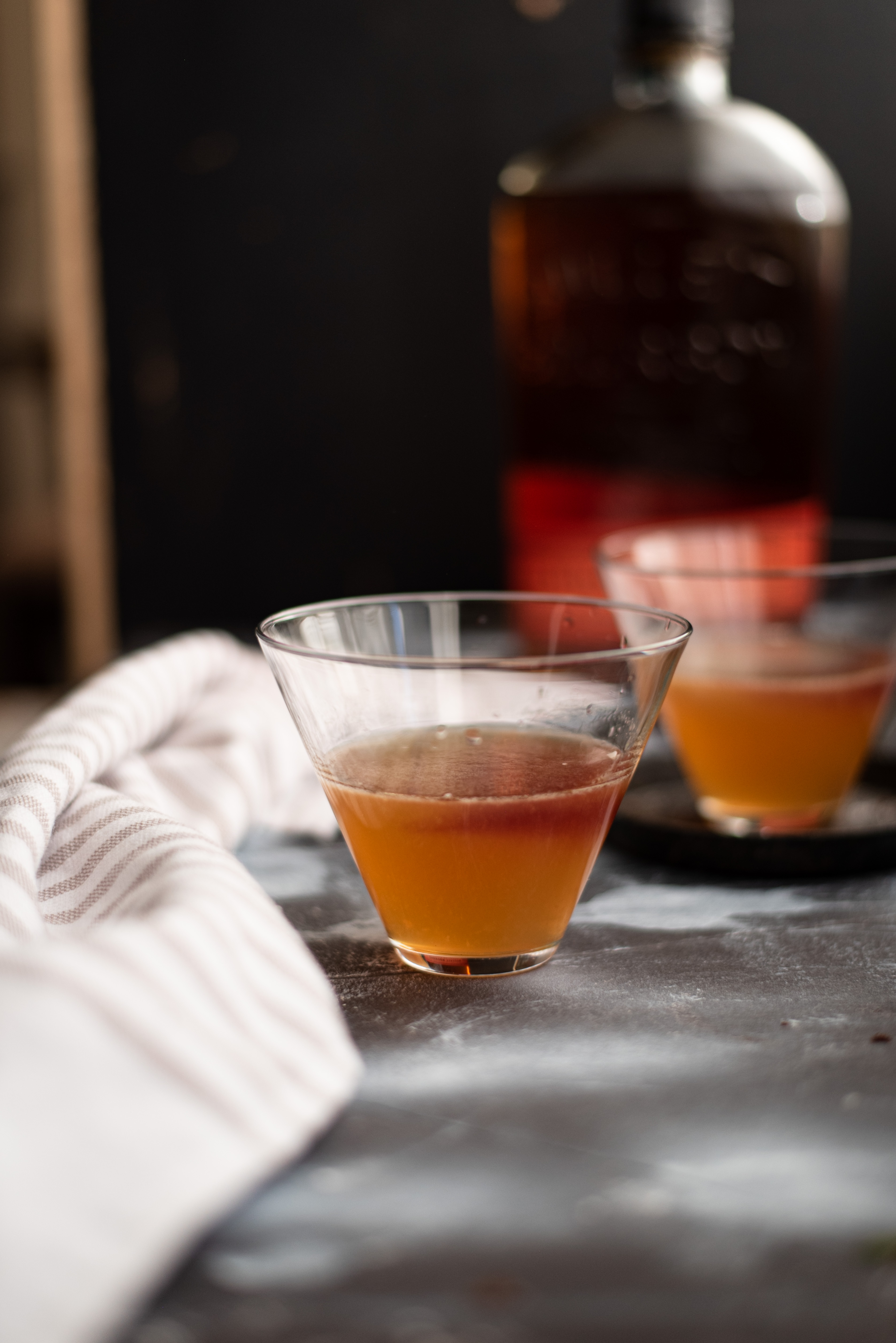 The recipe for Penicillin cocktail made with whiskey and honey ginger syrup prefect sipping during the fall or cold winter months. 