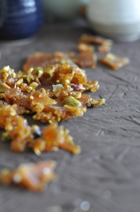 What can be better than a homemade brittle recipe made without any corn syrup, right?? This slightly crunchy homemade pistachio brittle recipe is the best!! The crunch of toffee, the deliciousness of pistachios, these pistachio candies go with almost everything. Use them as pretty packaged gifts or snacks or crumble them up on your favorite desserts!