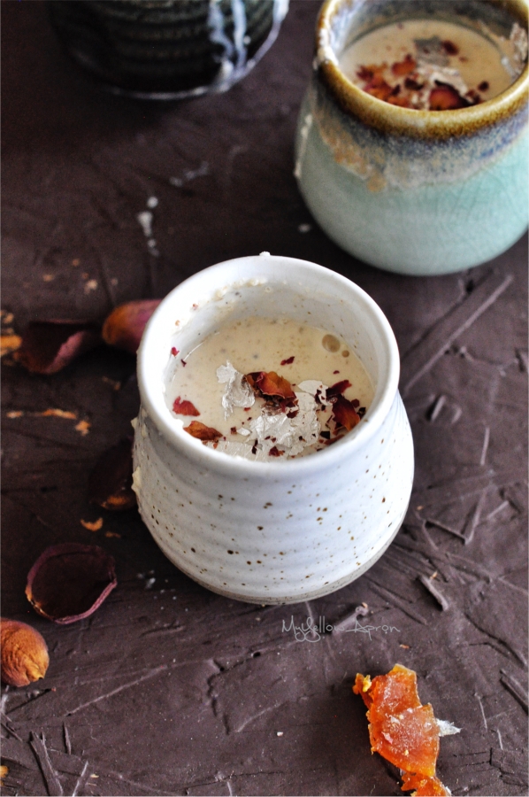 Delicious and creamy rose phirni (firni) served chilled with pistachio crumble on top!