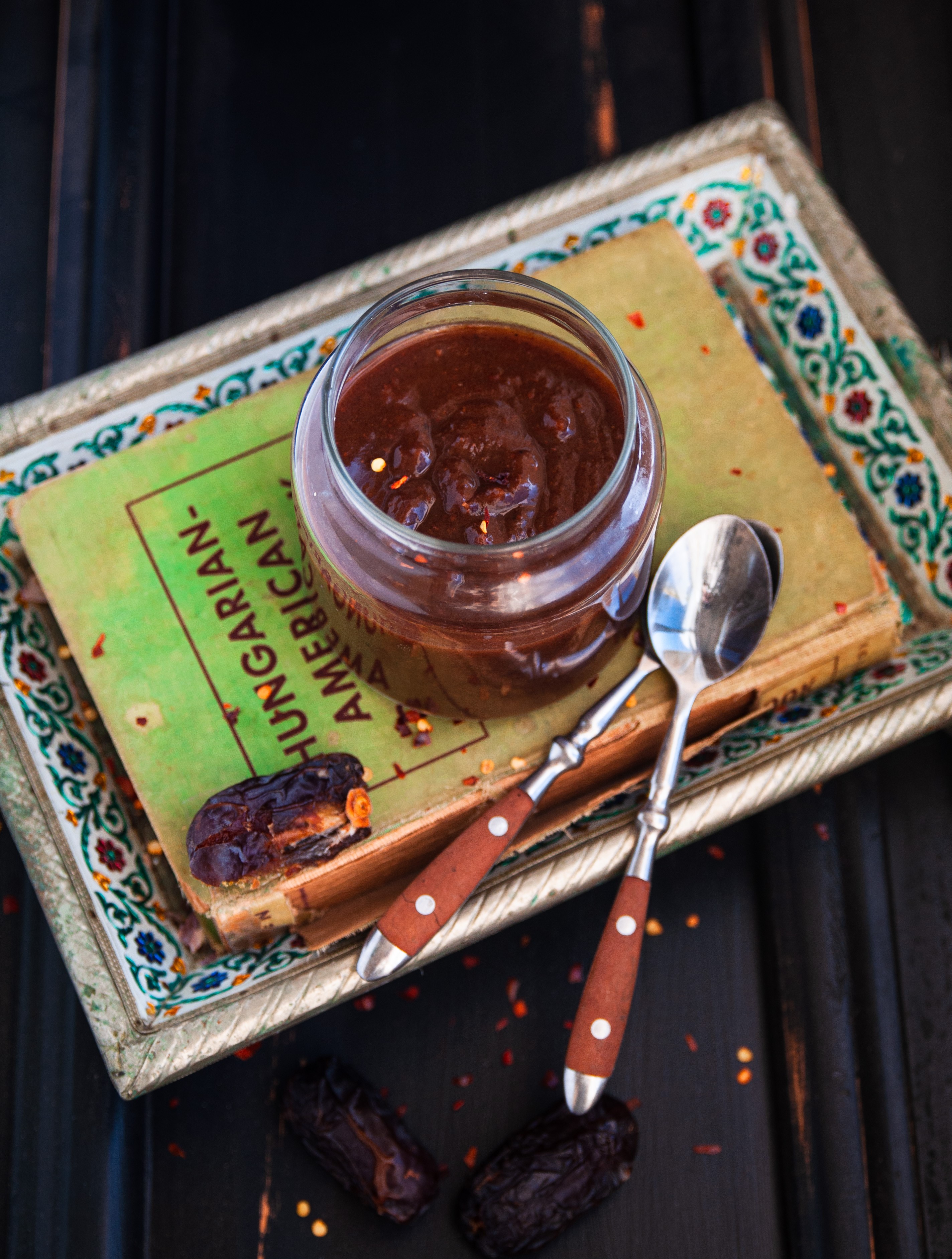 This sweet and sour tamarind chutney is made with dates and jaggery to be used as a dip for Indian street foods.