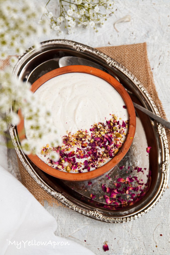 Creamy and luscious shrikhand made with thickened and sweetened greek yogurt with flavors of cardamom and rose 