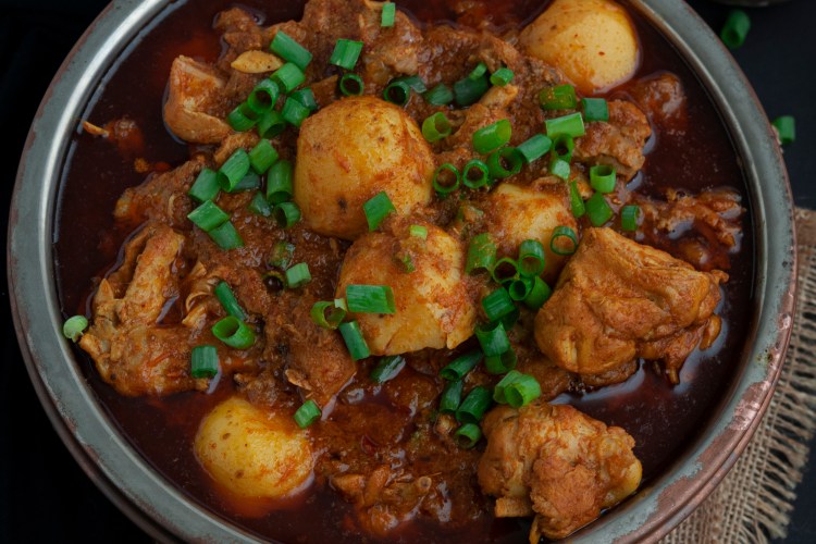 This simple, one-pot red hot Chicken Masala Curry with Potatoes recipe is so easy to make. Chicken and potatoes are cooked with fresh homemade masala powder, onion, and ginger-garlic paste, resulting in a zesty curry, that is so perfect for dipping your roti or naan or scooping up with rice!!