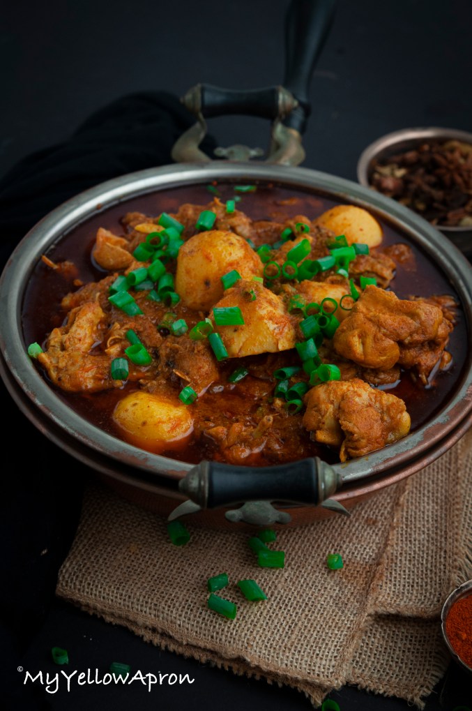 This simple, one-pot red hot Chicken Masala Curry with Potatoes recipe is so easy to make. Chicken and potatoes are cooked with fresh homemade masala powder, onion, and ginger-garlic paste, resulting in a zesty curry, that is so perfect for dipping your roti or naan or scooping up with rice!!